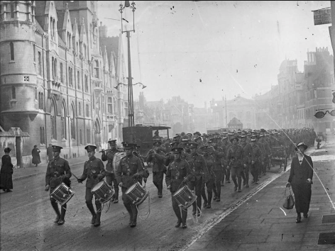 An old photograph of a marching band on Oxford's Broad Street