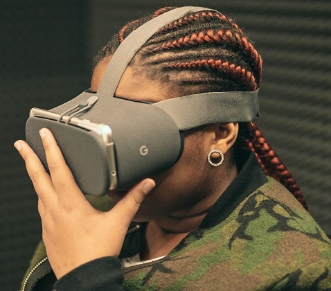 Colour in tech 35 - Credit: colorintech A black student wearing a virtual reality headset