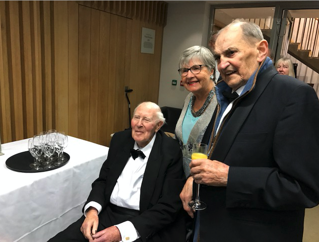 The late Sir Roger Bannister, Brian Wilson, and Terry Slesinski-Wykowski at a drinks reception