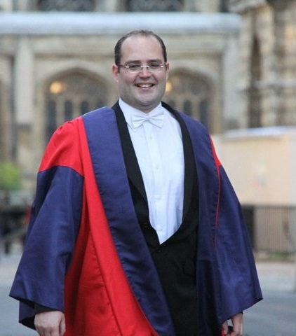 Tarek Cheniti in graduation gowns