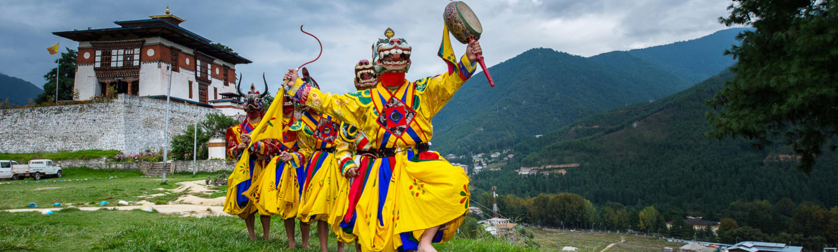 Costumed monks performing traditional dance in Tsechu festival at Thimphu Bhutan