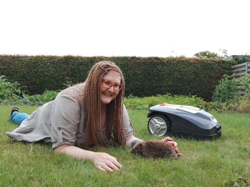 Dr Sophie Rasmussen with a hedgehog