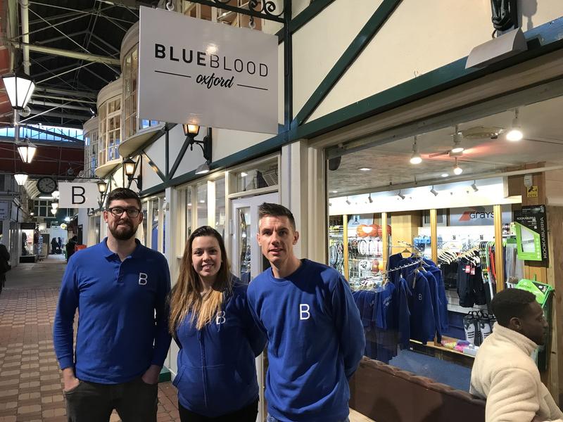 Staff of Blue Blood outside the shop in the Covered Market
