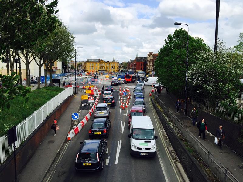 Looking up Botley Road toward Frideswide Square from the pedestrian bridge which crosses the road, with heavy traffic in both directions