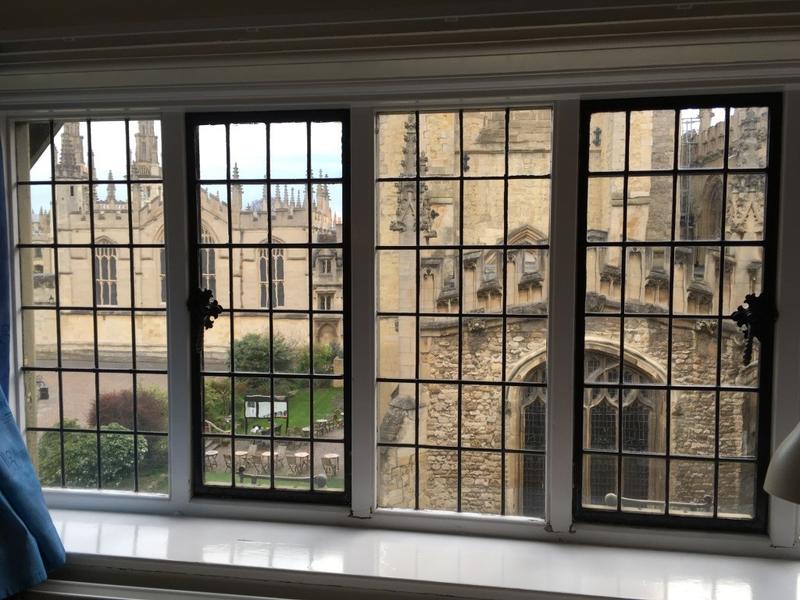The view from a window of Brasenose College, with University Church of St Mary the Virgin in the foreground and All Souls College in the background