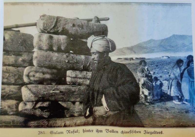 A picture of Ghulam Rasool Galwan in 1907 with bales of tea destined for Leh