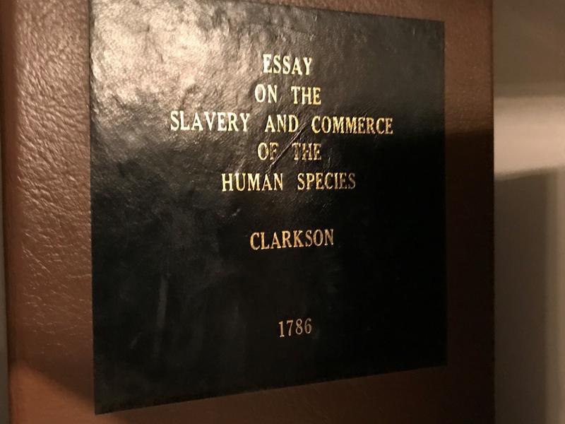 The cover of an old book, 'Essay on the slavery and commerce of the human species' by Clarkson from 1786