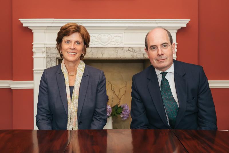 Oxford University Vice-Chancellor Professor Louise Richardson, and Legal and General Chairman Sir John Kingman, seated at a table