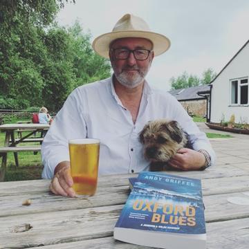 Author Andy Griffee and Eddie, the border terrier, enjoy a break at the Isis Farmhouse pub.