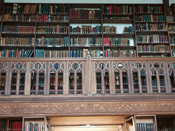 Book of shelves on a balcony inside the Gladstone Library