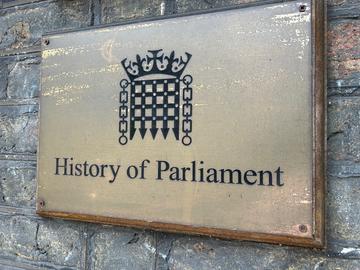 Brass door plate displaying the words, 'History of Parliament'