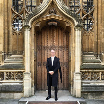 Jack Kelly outside an entrance to the Bodleian Library