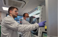 PhD student Dominic Melvin (left) and Dr Junfu Bu (right) working in the Department of Materials, University of Oxford